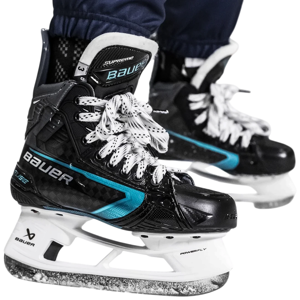 Lettermen Sports Bauer Supreme Fuse youth hockey skate in black with blue accents and white laces on ice