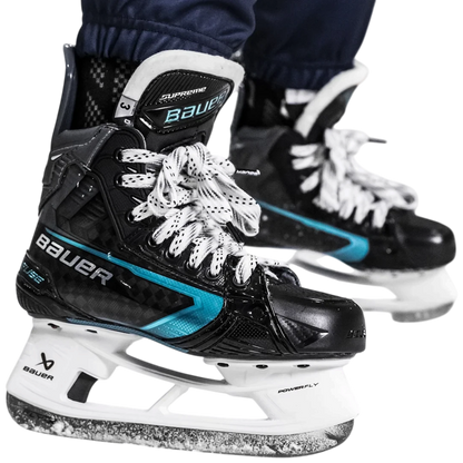 Lettermen Sports Bauer Supreme Fuse youth hockey skate in black with blue accents and white laces on ice