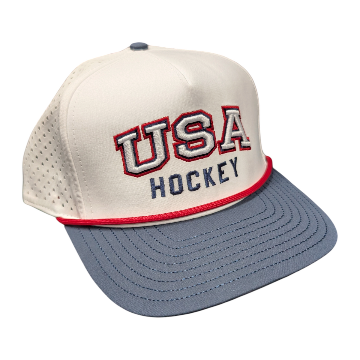 Lettermen Sports HockeYak USA hockey trucker cap in white, navy, and red with embroidered lettering and rope detail.